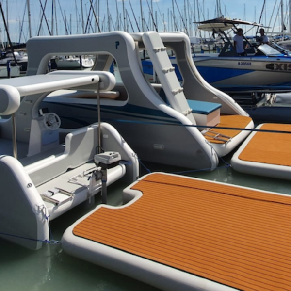 Two boats with inflatable rafts